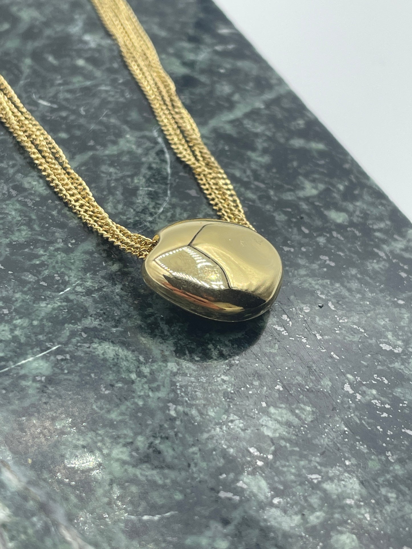 Hanging Golden Ovoid Necklace