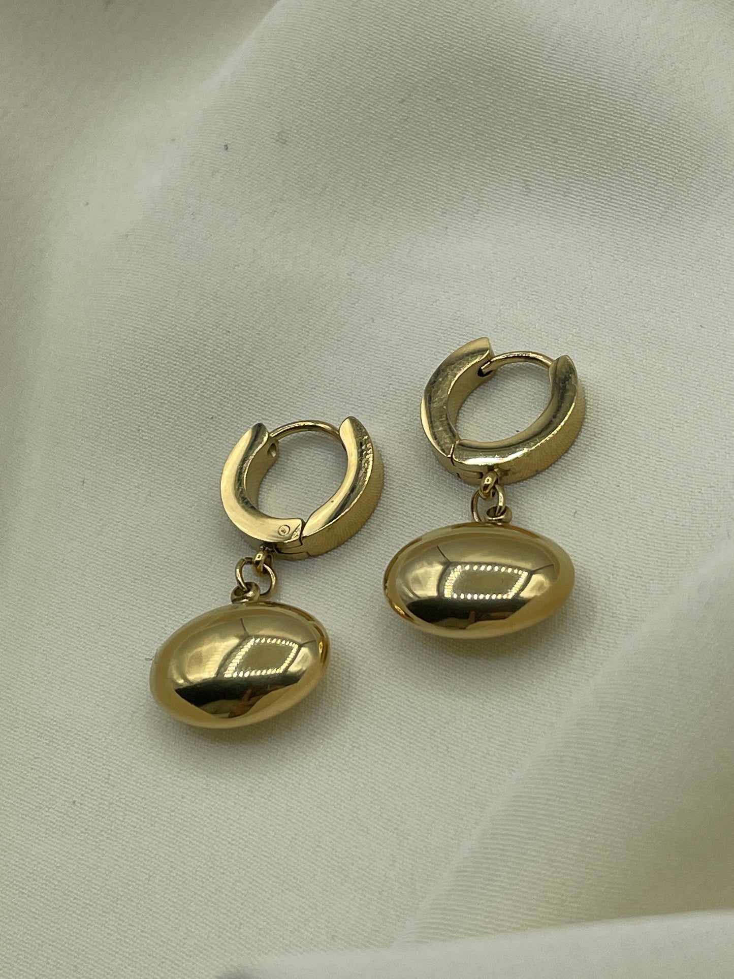 Hanging Golden Ovoid Earrings