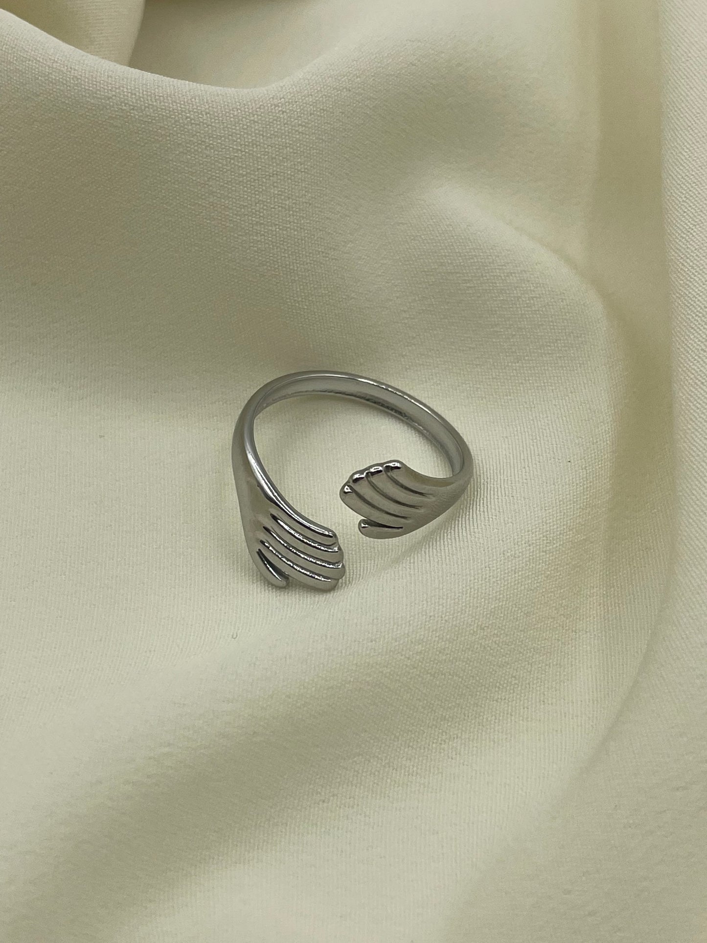 Enlacing Hands Ring Silver