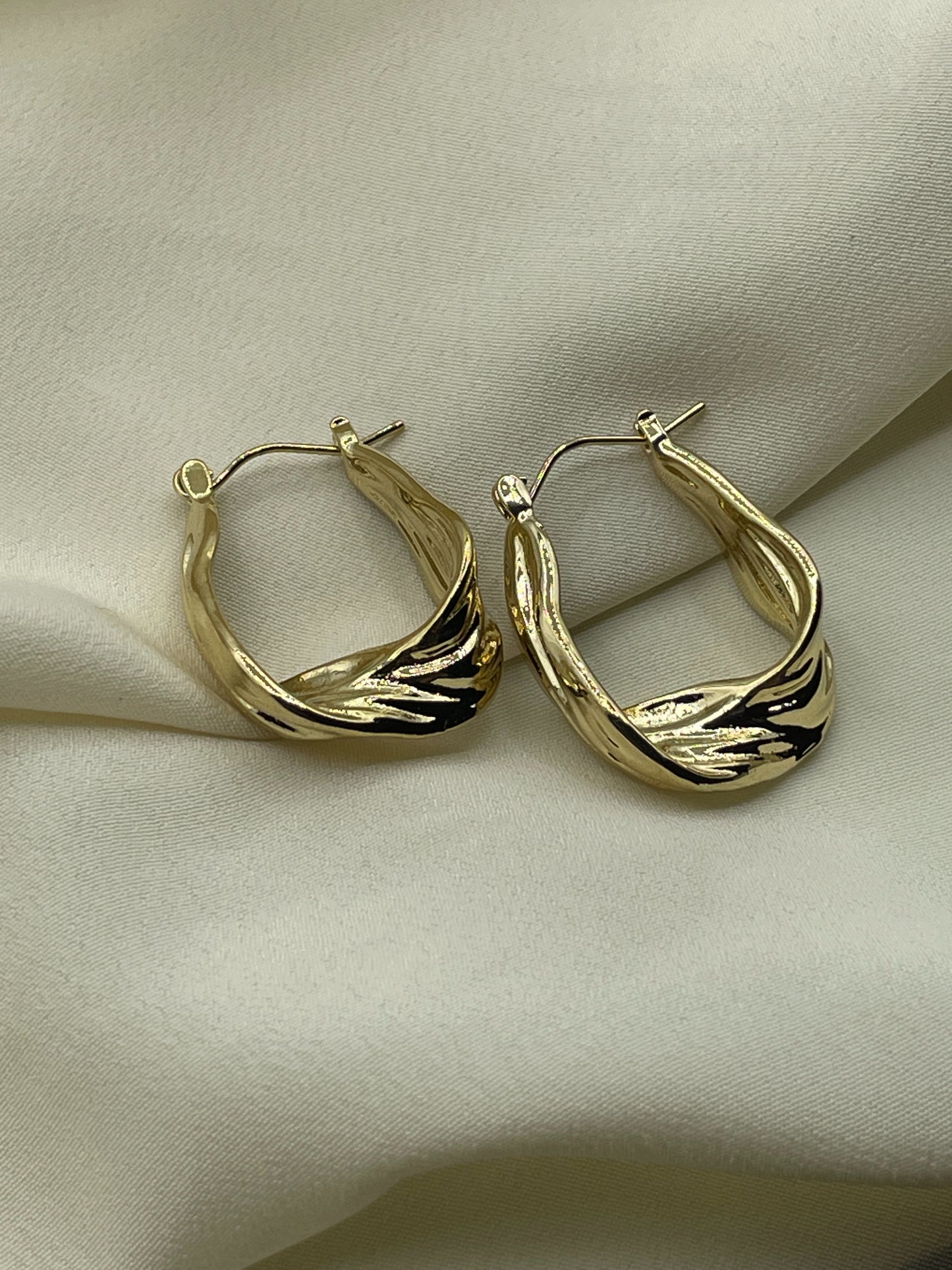 Twisted Hoops Earrings Gold