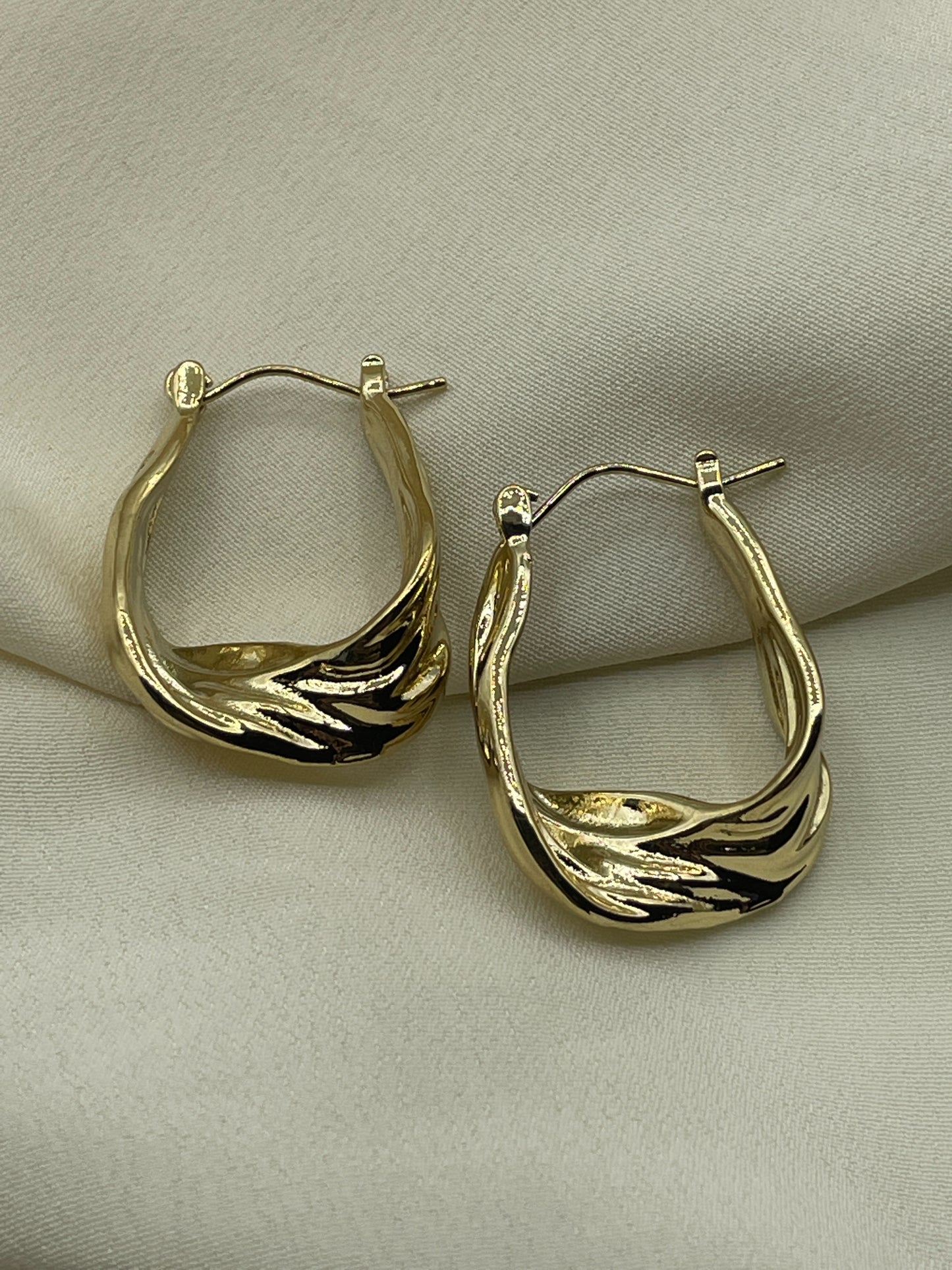 Twisted Hoops Earrings Gold