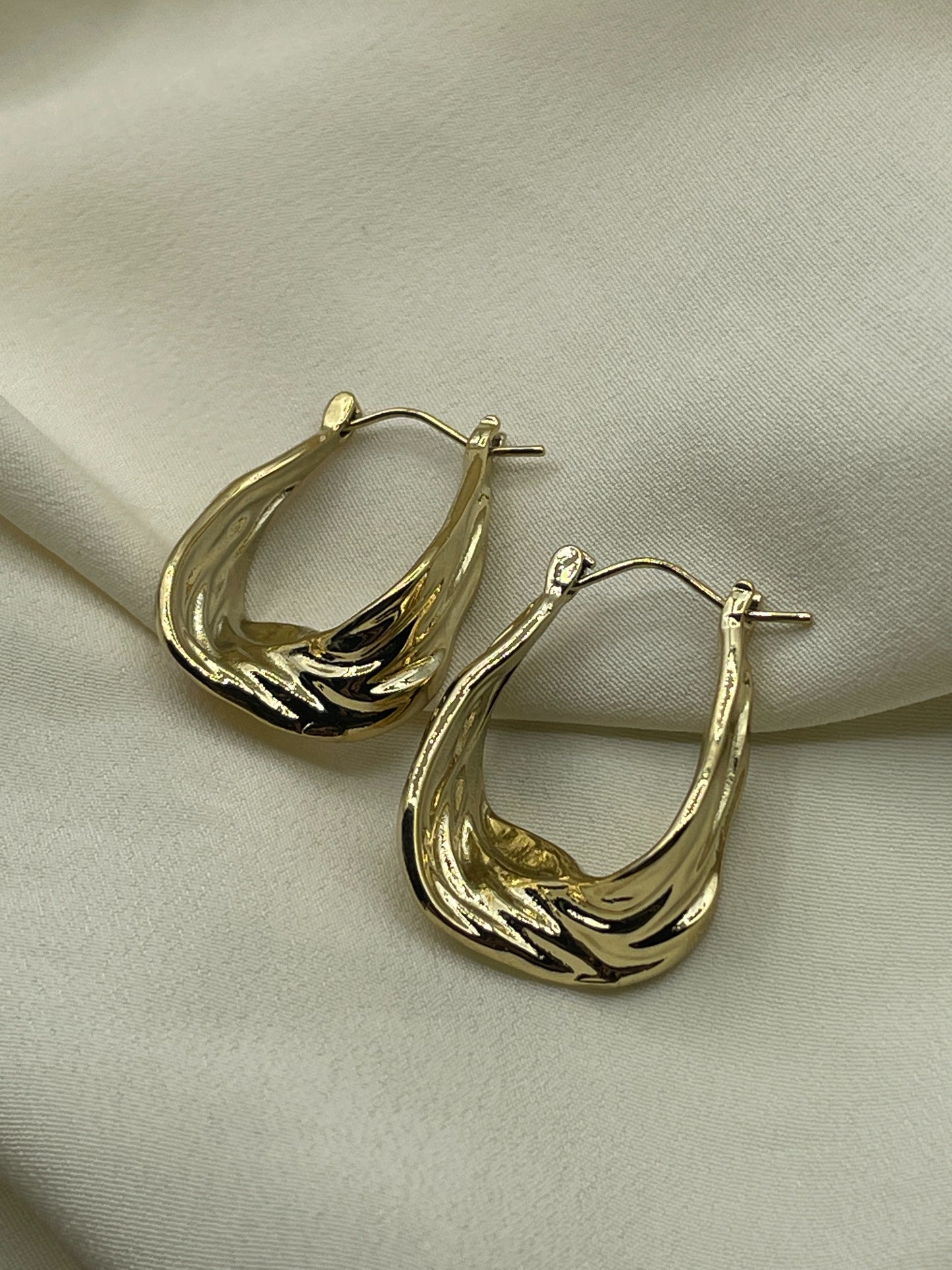 Twisted Hoops Earrings Gold